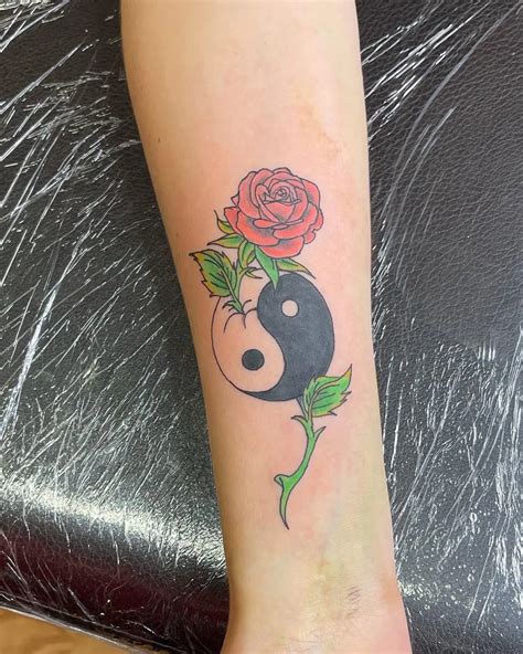 yin yang rose tattoo|yin yang wrist tattoo.